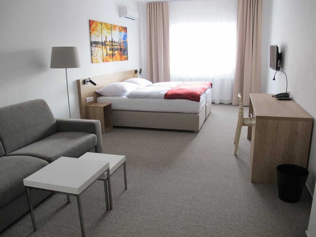 Hotel Kapitol Мост Номер фото